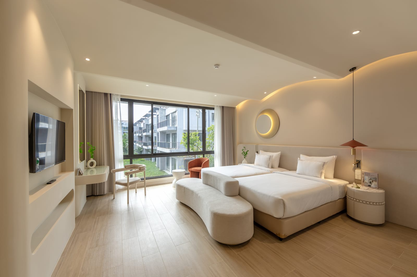 Twin beds and window-side seating